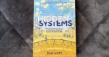 Hidden Systems is a book that could teach your kids how the internet works